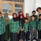 Foto bersama anak-anak SLB NU Suruh. (doc. KKN 273 UNS)a anak-anak SLB NU Suruh. (doc. KKN 273 UNS)