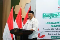 Kepala Kesatuan Bangsa dan Politik (Kesbangpol) Kabupaten Trenggalek, Sunyoto, memberikan sambutan sekaligus membuka Musyawarah Daerah (Musda) VI DPD LDII Kabupaten Trenggalek di Gedung Bhawarasa, Rabu (28/1/2026). Foto: Pribadi