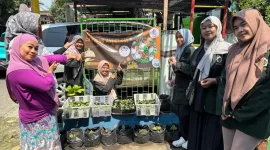 Dokumentasi pemasangan banner pada UMKM 