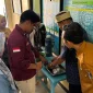 Pelaksanaan workshop pemanfaatan sekam padi menjadi briket ramah lingkungan dan pupuk kompos di Kantor Desa Kebon Ratu, Kecamatan Lebak Wangi, Kabupaten Serang, Banten, Selasa (28/7/2026). Sumber: KKM UNIBA 27